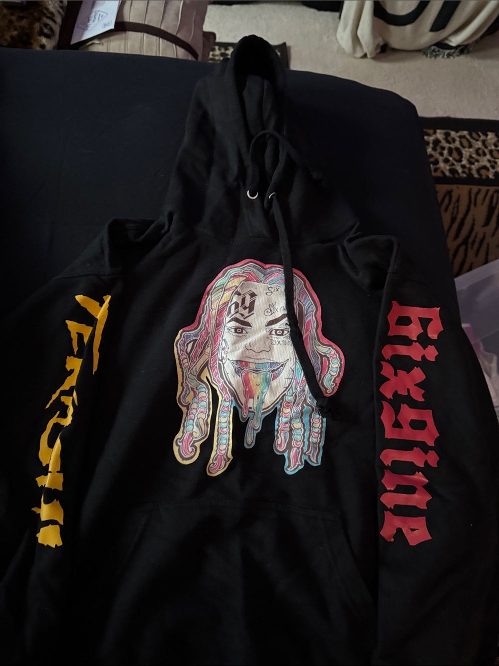 Black Graphic Hoodie with Colorful Dripping Face Print
